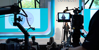 Image from behind a camera at a conference