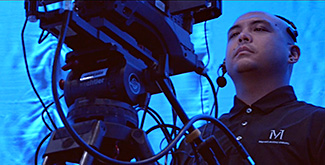 Image of a Metro Audio Visual camera operator